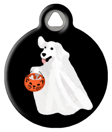 A round black pet ID tag with a white illustration of a dog ghost holding a pumpkin.