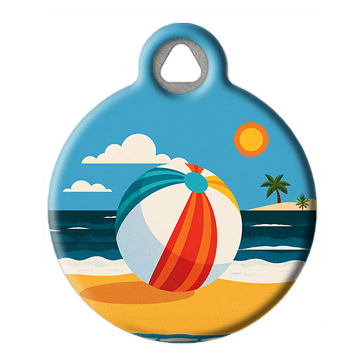 Round keychain with a beach design featuring a colorful ball, ocean, and palm trees on a blue background.